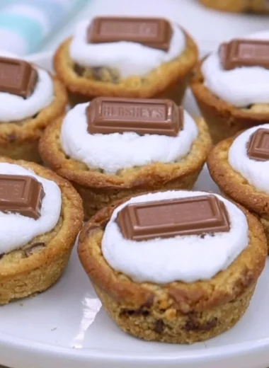Delicious 4 Ingredient S'Mores Cookie Cups showcasing chocolate and marshmallows
