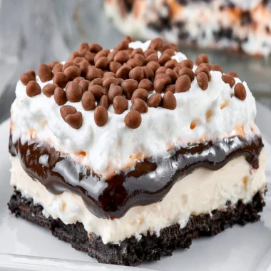 Delicious chocolate lasagna dessert with creamy layers and chocolate topping