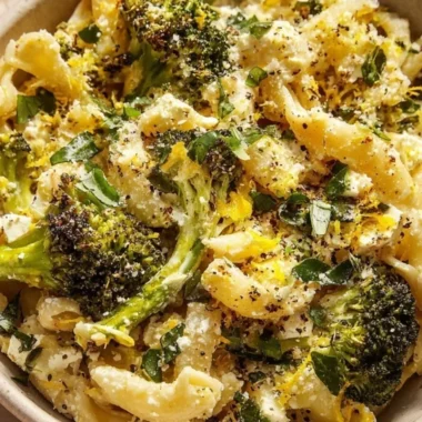 Cozy baked feta pasta with broccoli in a serving dish
