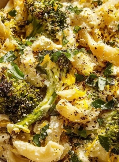 Cozy baked feta pasta with broccoli in a serving dish