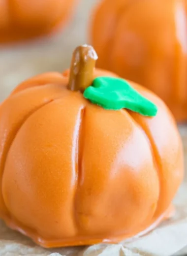 No-bake pumpkin shaped Oreo balls decorated for autumn treats
