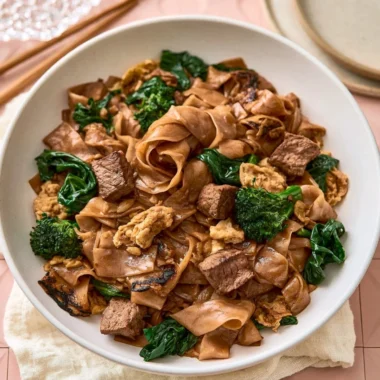 Delicious quick Thai stir-fry with colorful vegetables and chicken in a pan