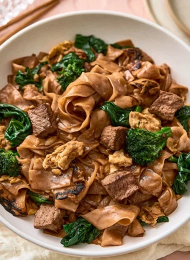 Delicious quick Thai stir-fry with colorful vegetables and chicken in a pan