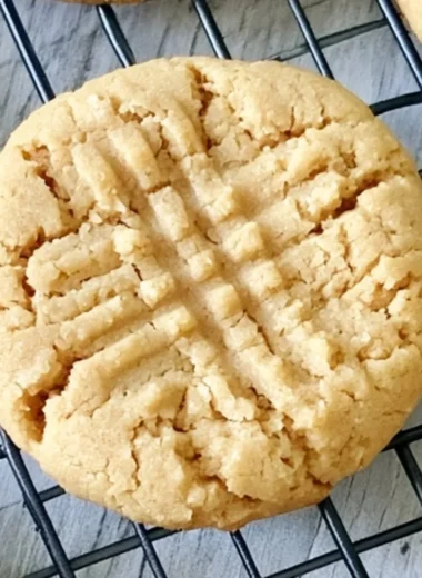 Delicious soft peanut butter cookies on a cooling rack