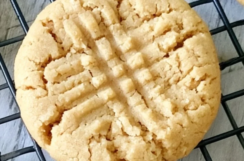 Delicious soft peanut butter cookies on a cooling rack