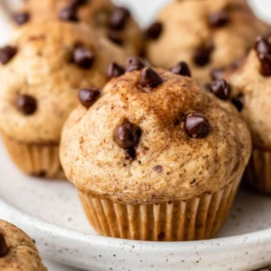 Cozy cottage cheese muffins with chocolate chips on a rustic table