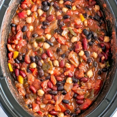 Bowl of cozy slow cooker vegetarian chili with beans and spices