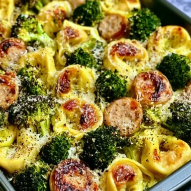 Sheet pan broccoli tortellini bake with cheese and veggies fresh from the oven