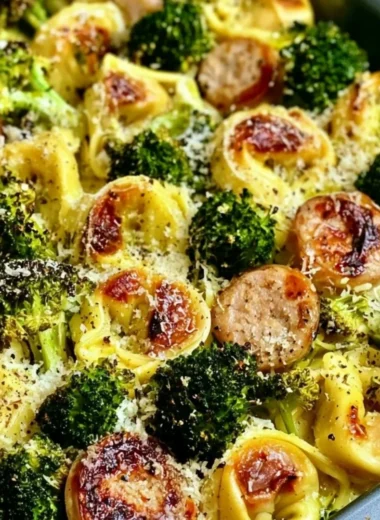 Sheet pan broccoli tortellini bake with cheese and veggies fresh from the oven