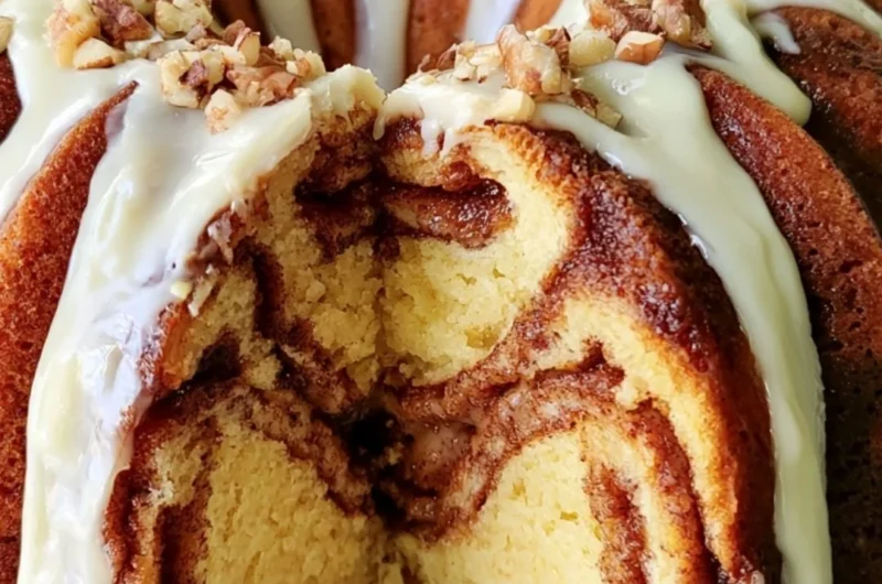 Delicious Easy Cinnamon Roll Bundt Cake topped with icing