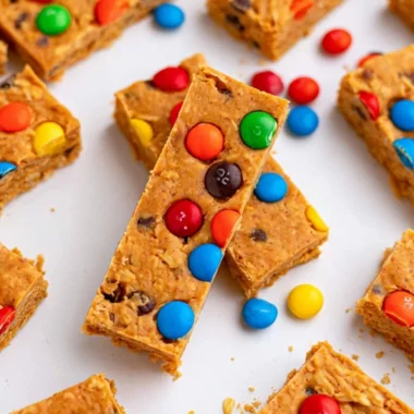 No-Bake Monster Cookie Protein Bars with oats, chocolate chips, and peanut butter