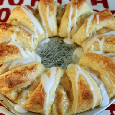 Golden apple crescent ring baked with cinnamon and apple filling.