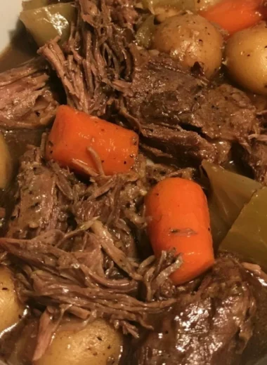 Delicious slow cooker pot roast with carrots and potatoes