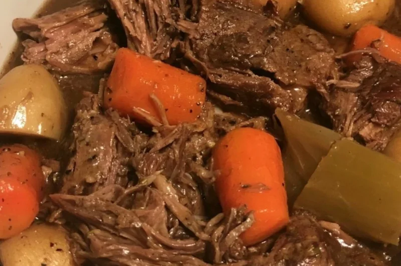 Delicious slow cooker pot roast with carrots and potatoes