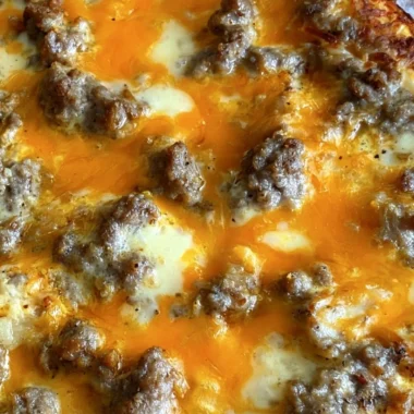 Delicious Christmas morning casserole topped with herbs and cheese