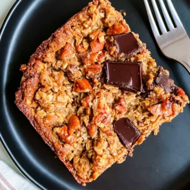 Protein baked oatmeal with chocolate chunks served in a bowl