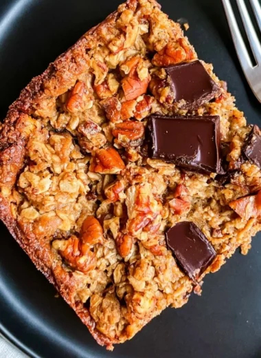 Protein baked oatmeal with chocolate chunks served in a bowl